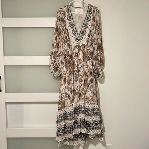 Flowy gown with plunging neckline